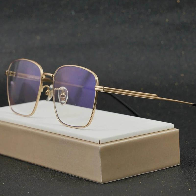Gold-Rimmed Glasses